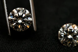A lab grown diamond, left, and a natural diamond are displayed at Bario Neal, a jewelry store, in Philadelphia, Wednesday, Feb. 7, 2024.