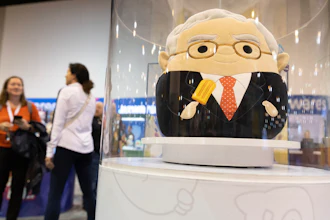 The Squishmallows booth sells toys modeled after Warren Buffett, pictured, and Charlie Munger in the exhibit hall for the Berkshire Hathaway annual meeting, Saturday, May 6, 2023, in Omaha, Neb.