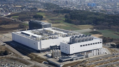 This photo shows a newly built plant for Taiwan Semiconductor Manufacturing Co. (TSMC) in Kikuyo town, a suburb of Kumamoto, southwestern Japan, Feb. 12, 2024.