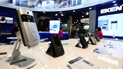 An EKEN doorbell camera, along with other models, are shown on display at CES International, Jan. 10, 2019, in Las Vegas.