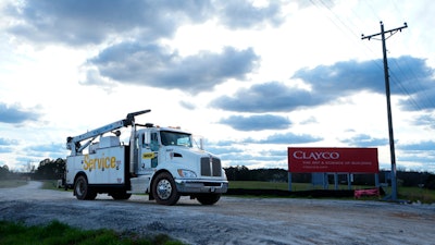 A truck leaves the site of a planned Rivian electric truck plant Thursday, March 7, 2024, in Rutledge,Ga.