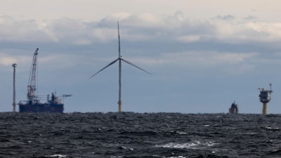 The first operating South Fork Wind farm turbine, Thursday, Dec. 7, 2023, stands east of Montauk Point, N.Y. South Fork Wind, America's first commercial-scale offshore wind farm, is officially open.