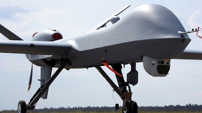 An MQ9 Predator drone is displayed at the Berlin Air Show ILA in Berlin, Germany, on May 30, 2016. China on Thursday, April 11, 2024 announced sanctions against two U.S. defense companies, one of which produces the Predator drone, over what it says is their support for arms sales to Taiwan, the self-governing island democracy Beijing claims as its own territory to be recovered by force if necessary.