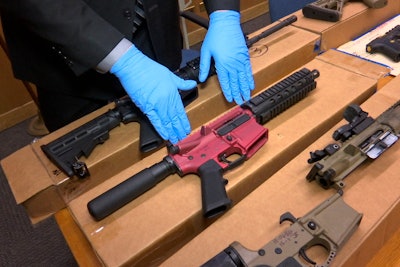 'Ghost guns' are displayed at the headquarters of the San Francisco Police Department in San Francisco, Nov. 27, 2019.