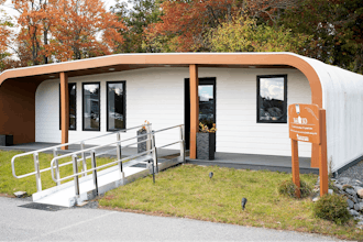 The University of Maine's first 3D printed home sits on Oct. 12, 2023, in Orono, Maine.