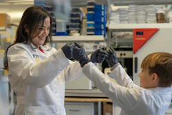 Researcher Diana Azzam and Logan Jenner, a participant in her clinical study, in the Azzam Lab at Florida International University.