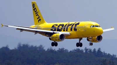 A Spirit Airlines 319 Airbus approaches Manchester Boston Regional Airport for a landing, June 2, 2023, in Manchester, N.H.