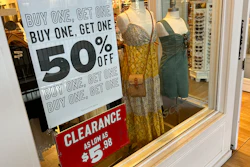 Signs in a clothing store in Lone Tree, Colo., April 29, 2024.