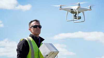 Michael Jones operates his drone, April 2, 2021, in Goldsboro, N.C. A North Carolina board that regulates land surveyors didn't violate the drone photography pilot's constitutional rights when it told him to stop advertising and offering aerial map services because he lacked a state license, a federal appeals court ruled on Monday, May 20, 2024.