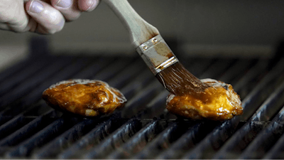 Chef Zach Tyndall prepares Good Meat's cultivated chicken at the Eat Just office in Alameda, Calif., June 14, 2023.