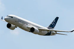 An Airbus A220 lands at Toulouse-Blagnac airport.