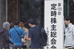 Toyota shareholders arrive for a meeting in Toyota, Aichi prefecture, central Japan,