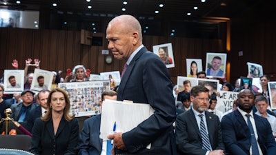 Boeing CEO Dave Calhoun arrives to testify before the Senate Homeland Security and Governmental Affairs Subcommittee on Investigations.