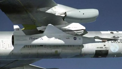 NASA’s B-52B launch aircraft cruises to a test range over the Pacific Ocean carrying the third and final X-43A vehicle, attached to a Pegasus rocket, on Nov. 16, 2004.