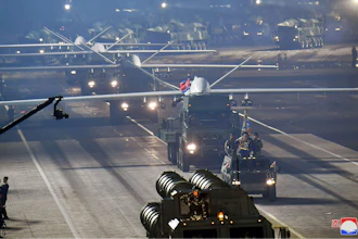 This photo provided by the North Korean government, shows what it says attack drones during a military parade to mark the 70th anniversary of the armistice.