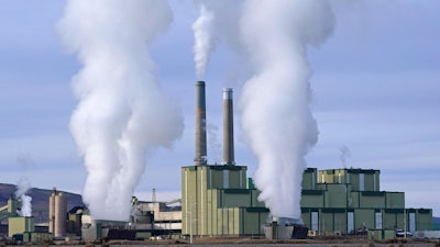 Steam billows from a coal-fired power plant in Craig, Colo.