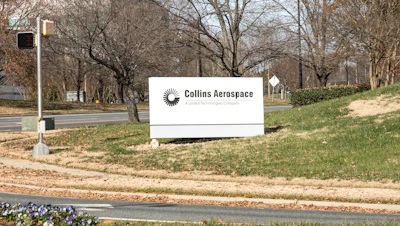 A street sign for Collins Aerospace.