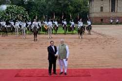 Indian Prime Minister Narendra Modi, right, receives his Vietnamese counterpart Pham Minh Chinh, during a ceremonial reception at the Rashtrapati Bhavan in New Delhi, India.