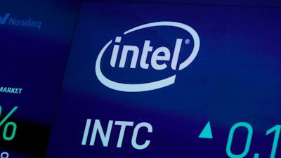 The symbol for Intel appears on a screen at the Nasdaq MarketSite in New York.
