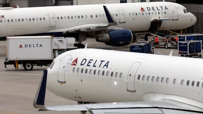 A Delta Air Lines plane leaves the gate at Logan International Airport in Boston.
