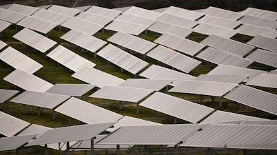 Some of the about 30 hectares (74 acres) of solar panels at the Williamsdale Solar Farm are displayed south of Canberra, Australia.