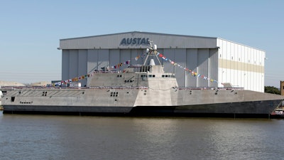 The Littoral Combat Ship Coronado sits alongside the Austal USA facilities on the Mobile River in Mobile, Ala., following christening ceremonies for the ship.