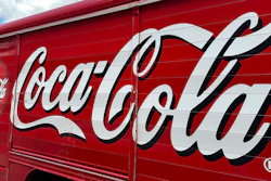 The Coca-Cola logo adorns the side of a delivery truck May 15, 2024, in southeast Denver. Coca-Cola reports earnings on Tuesday, July 23, 2024.