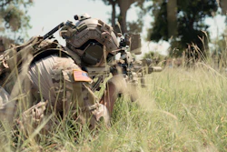 Special forces soldier in battle training scenario.