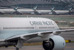 A Cathay Pacific airplane taxis at Hong Kong International Airport in Hong Kong.