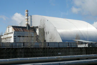 A shelter construction covers the exploded reactor at the Chernobyl nuclear plant, in Chernobyl, Ukraine.