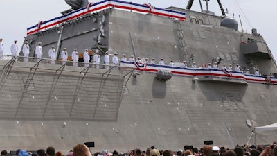 Thousands attend the commissioning ceremony for the USS Manchester at the New Hampshire State Pier in Portsmouth, N.H.