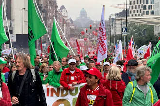 Workers of the German automaker Audi protest the threat of massive layoffs in downtown Brussels, Belgium, Monday Sept. 16, 2024.