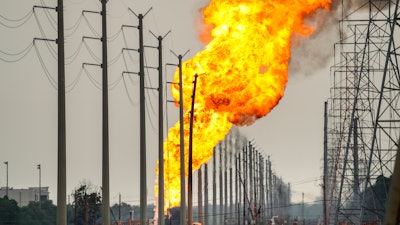 A pipeline carrying liquified natural gas burns near Spencer Highway and Summerton on Monday, Sept. 16, 2024, in La Porte, Texas.