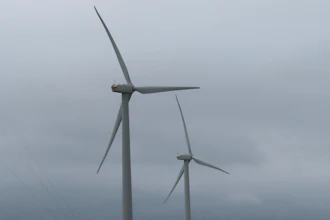 Land-based wind turbines spin in Atlantic City, N.J.