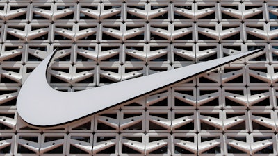 The Nike logo is shown on a store in Miami Beach, Fla.
