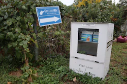 A new naloxone distribution box sits in a residential neighborhood in Hurricane, W.Va. on Tuesday, Sept. 24, 2024.