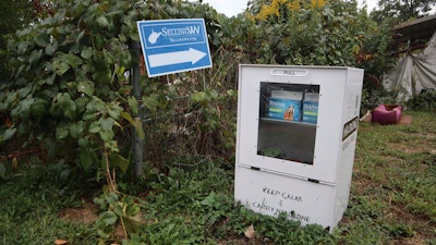 A new naloxone distribution box sits in a residential neighborhood in Hurricane, W.Va. on Tuesday, Sept. 24, 2024.