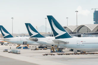 Cathay Pacific airline airplanes grounded at Hong Kong International airport.
