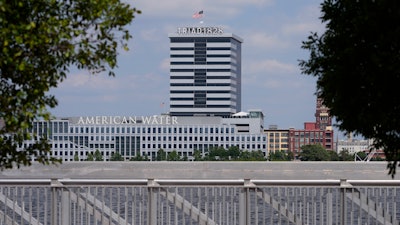 The largest regulated water and wastewater utility company in the U.S., American Water, its building in Camden, N.J., seen in the foreground on June 17, 2024, says it was the victim of a cyberattack, prompting the firm to pause billing to customers.