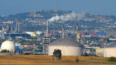 The Phillips 66 refinery is shown, July 16, 2014 in the Wilmington area of Los Angeles.