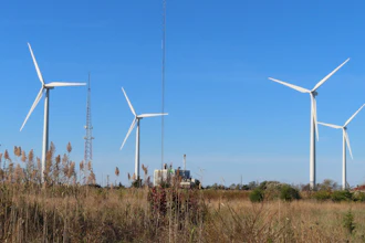 Land-based wind turbines spin in Atlantic City, N.J., on Nov. 3, 2023.