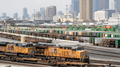 The Los Angeles skyline is seen above the Union Pacific LATC Intermodal Terminal is seen on April 25, 2023 in Los Angeles.