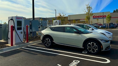 EV charging taking place outside a Costco.