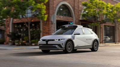 A Hyundai, Waymo vehicle in action.