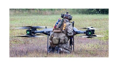 A military drone being loaded with blood for transport.