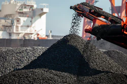 Coal fragments coming off a belt after mining.