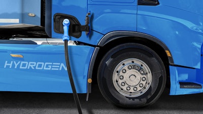 A hydrogen fuel cell semi truck with H2 refueling nozzle.