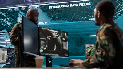 A military team operates threat detection missions.