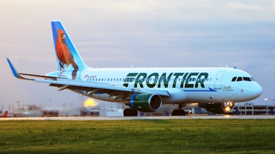 Frontier Airlines A320 lands at Cleveland Hopkins International Airport.