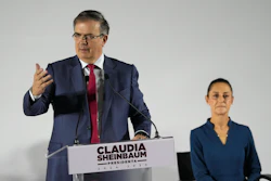 Mexico's former Foreign Affairs Secretary Marcelo Ebrard speaks at the press conference announcing incoming President Claudia Sheinbaum's Cabinet members, in Mexico City, June 20, 2024. Sheinbaum, right, chose Ebrard as her administration's economy secretary.